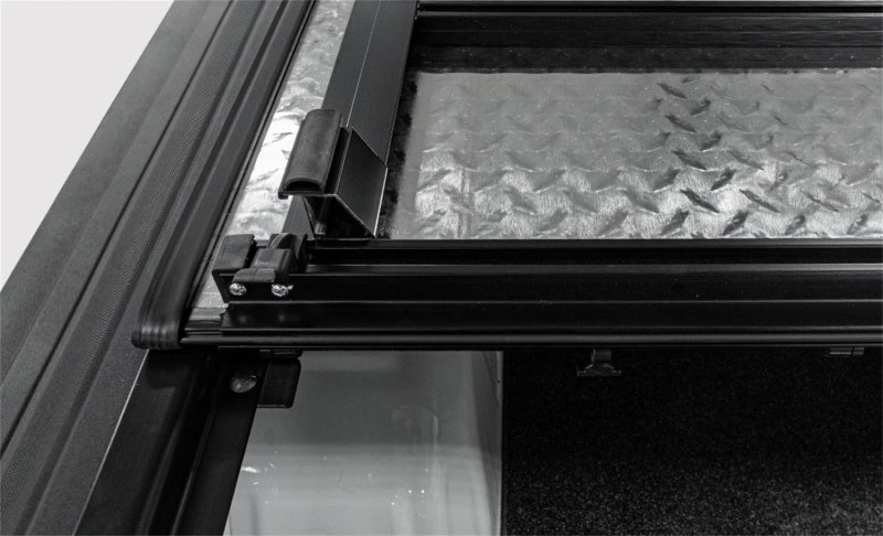 Access LOMAX Tri-Fold Cover Black Urethane Finish 16-20 Toyota Tacoma - 5ft Bed (w/o OEM Hard Cover) - Striker Modified