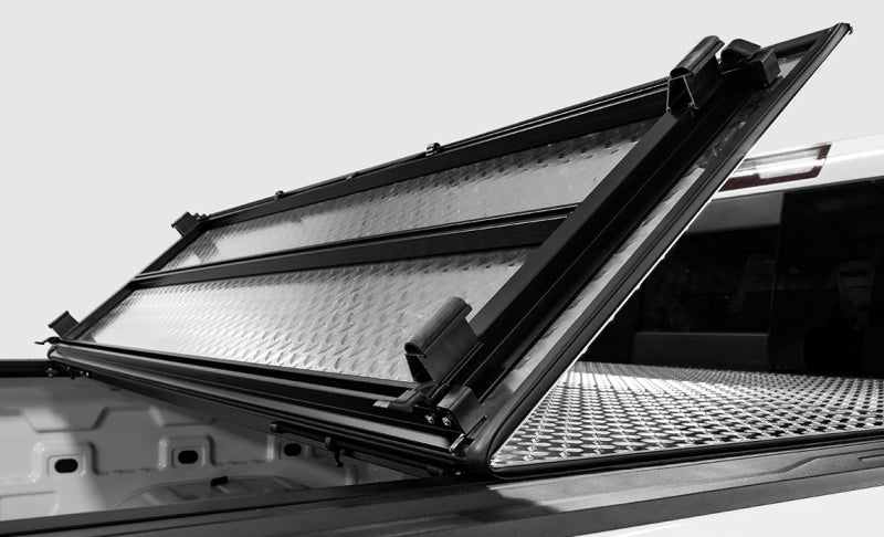Access LOMAX Tri-Fold Cover Black Urethane Finish 19+ Chevrolet Silverado 1500 - 6ft 6in Bed - Striker Modified