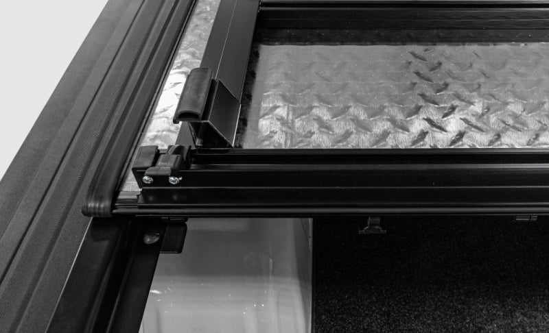 Access LOMAX Tri-Fold Cover Black Urethane Finish 16-20 Toyota Tacoma - 5ft Bed (w/o OEM Hard Cover) - Striker Modified