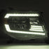 AlphaRex 05-11 Toyota Tacoma LUXX Crystal Headlights Plank Style Alpha Black w/Activation Light/DRL - Striker Modified