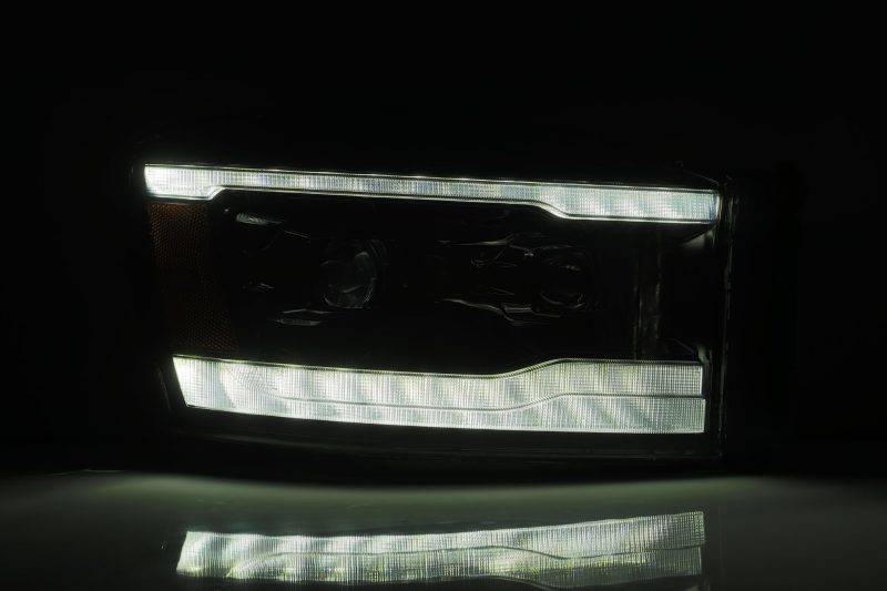 AlphaRex 06-08 Dodge Ram 1500HD PRO-Series Projector Headlights Plank Style Chrome w/Seq Signal/DRL - Striker Modified