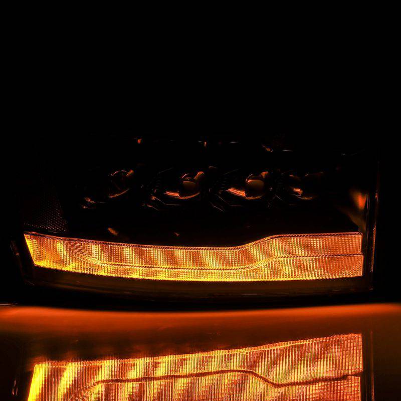 AlphaRex 06-08 Ram 1500HD NOVA LED Proj Headlights Plnk Style Alpha Blk w/Seq Signal/DRL/Amber LED - Striker Modified