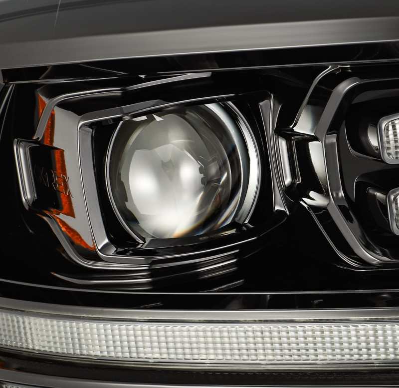 AlphaRex 09-18 Dodge Ram 2500HD LUXX LED Proj Headlights Plank Style Black w/Seq Signal/Smoked DRL - Striker Modified