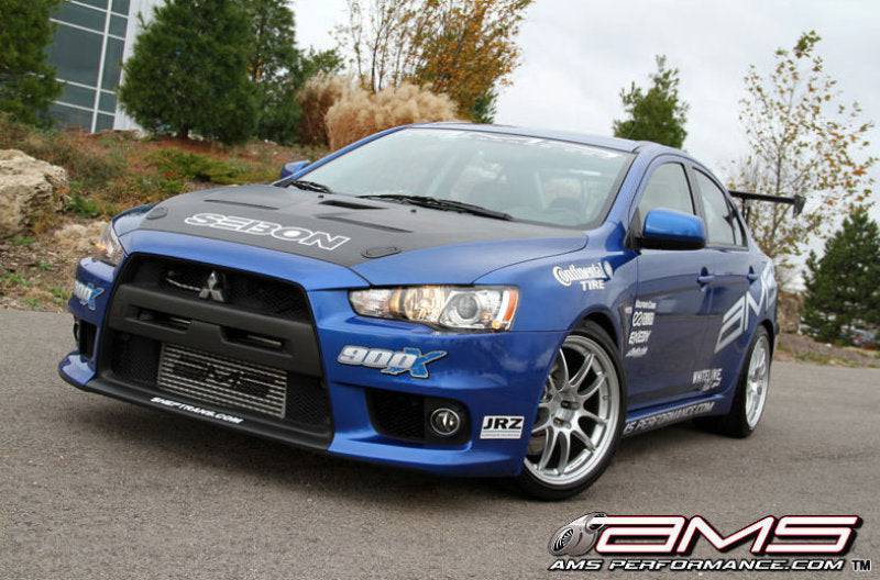 AMS Performance 08-15 Mitsubishi EVO X Front Mount Intercooler w/Modular Cast End Tanks & Logo - Striker Modified