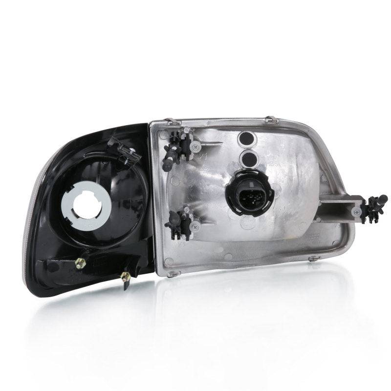 ANZO 1997-2003 Ford F150 Crystal Headlight Black w/ Parking Light - Striker Modified