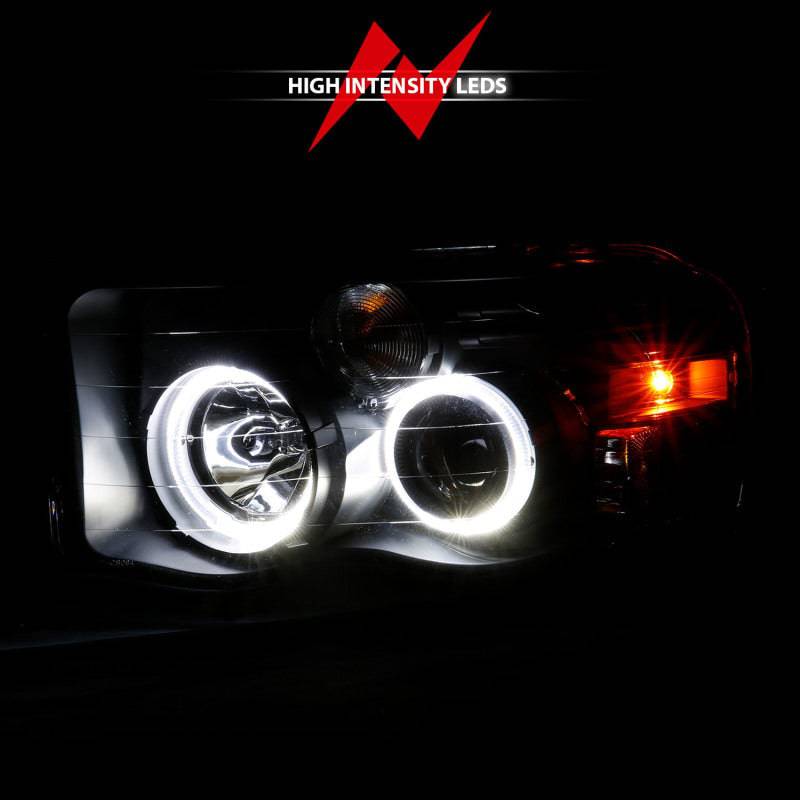 ANZO 2002-2005 Dodge Ram 1500 Projector Headlights w/ Halo Black Clear Amber - Striker Modified
