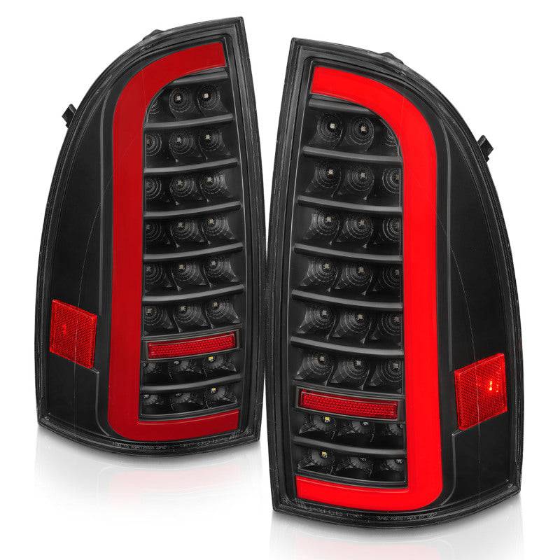 ANZO 05-15 Toyota Tacoma Full LED Tail Lights w/Light Bar Sequential Black Housing Clear Lens - Striker Modified