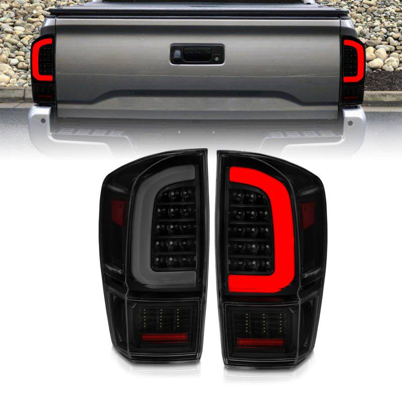 ANZO 16-21 Toyota Tacoma LED Tail Lights - w/ Light Bar Sequential Black Housing & Smoke Lens - Striker Modified