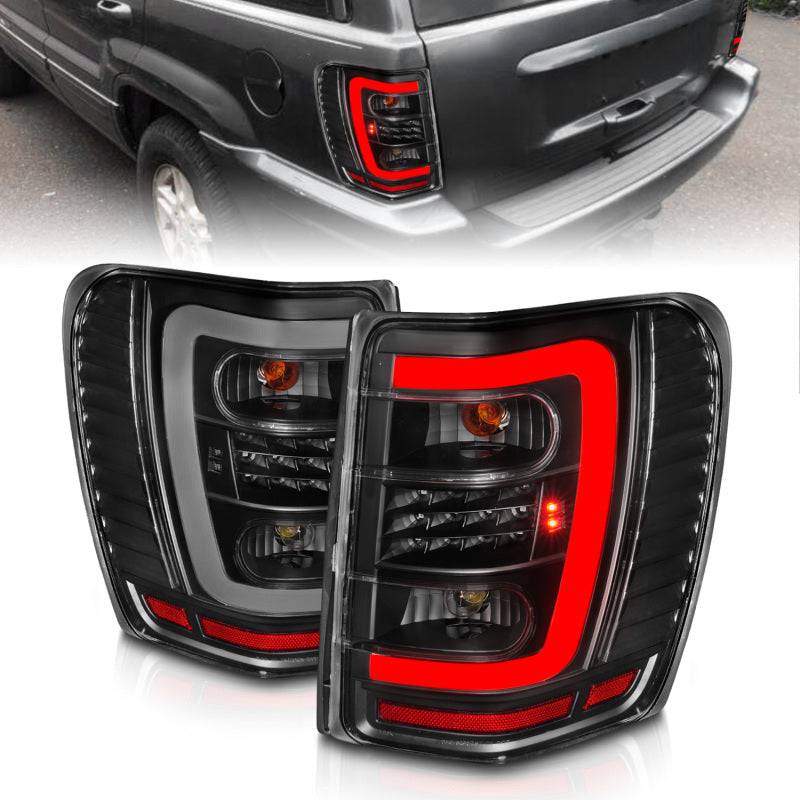 ANZO 1999-2004 Jeep Grand Cherokee LED Tail Lights w/ Light Bar Black Housing Clear Lens - Striker Modified