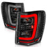 ANZO 1999-2004 Jeep Grand Cherokee LED Tail Lights w/ Light Bar Black Housing Clear Lens - Striker Modified