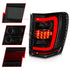 ANZO 1999-2004 Jeep Grand Cherokee LED Tail Lights w/ Light Bar Black Housing Smoke Lens - Striker Modified