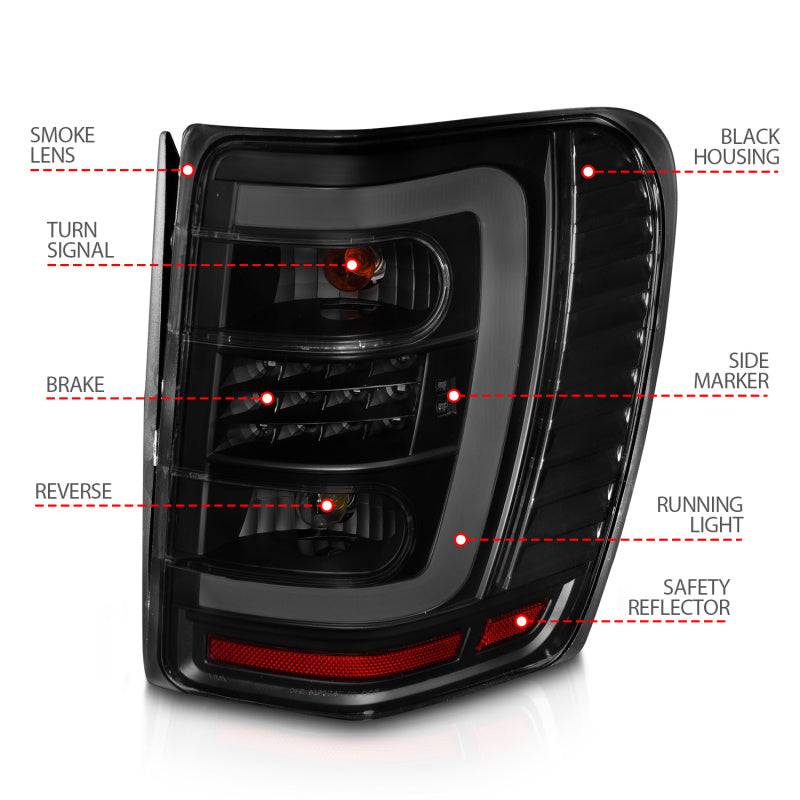ANZO 1999-2004 Jeep Grand Cherokee LED Tail Lights w/ Light Bar Black Housing Smoke Lens - Striker Modified