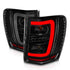 ANZO 1999-2004 Jeep Grand Cherokee LED Tail Lights w/ Light Bar Black Housing Smoke Lens - Striker Modified