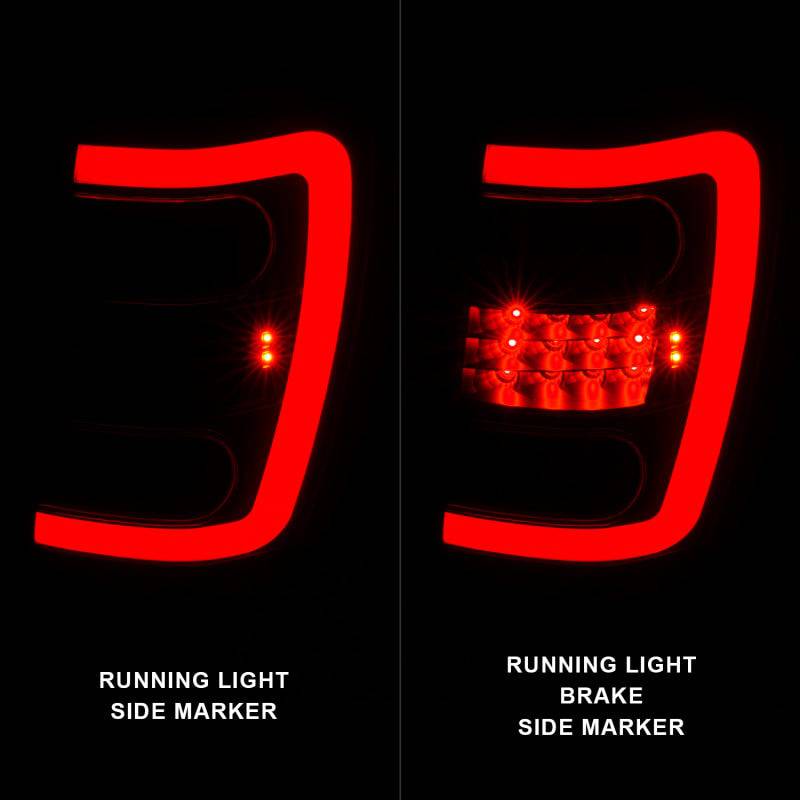 ANZO 1999-2004 Jeep Grand Cherokee LED Tail Lights w/ Light Bar Black Housing Smoke Lens - Striker Modified