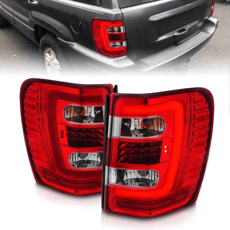 ANZO 1999-2004 Jeep Grand Cherokee LED Tail Lights w/ Light Bar Chrome Housing Red/Clear Lens - Striker Modified