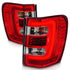 ANZO 1999-2004 Jeep Grand Cherokee LED Tail Lights w/ Light Bar Chrome Housing Red/Clear Lens - Striker Modified