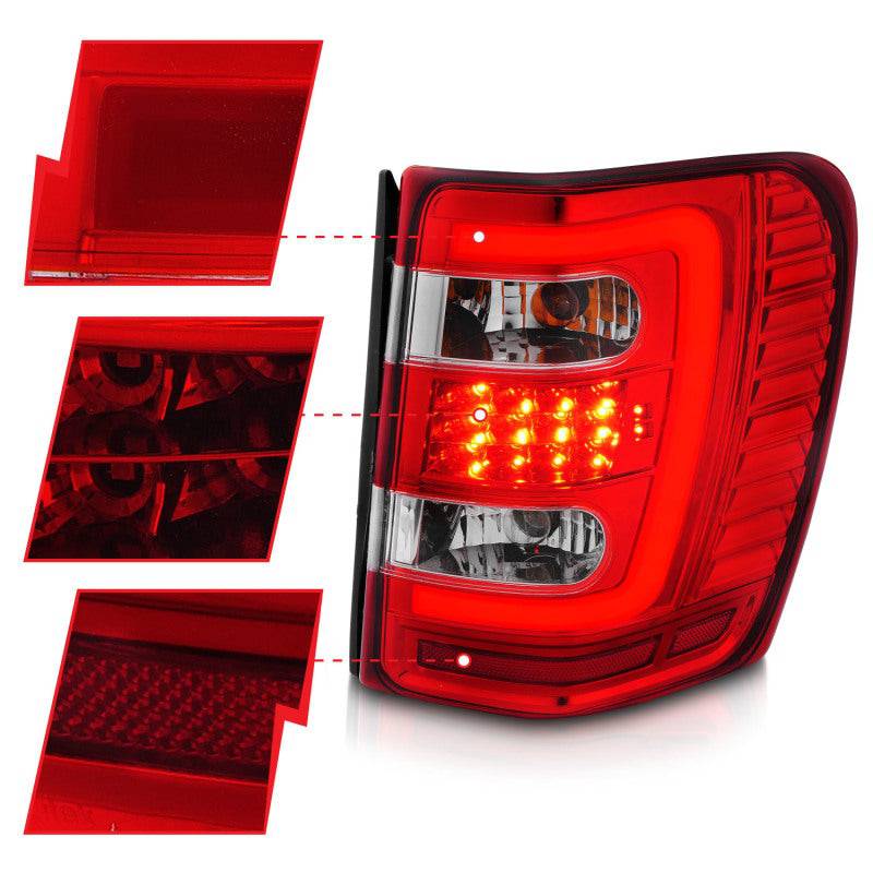 ANZO 1999-2004 Jeep Grand Cherokee LED Tail Lights w/ Light Bar Chrome Housing Red/Clear Lens - Striker Modified