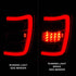 ANZO 1999-2004 Jeep Grand Cherokee LED Tail Lights w/ Light Bar Chrome Housing Red/Clear Lens - Striker Modified