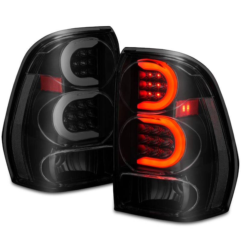 ANZO 2002-2009 Chevrolet Trailblazer LED Tail Lights w/ Light Bar Black Housing Smoke Lens - Striker Modified