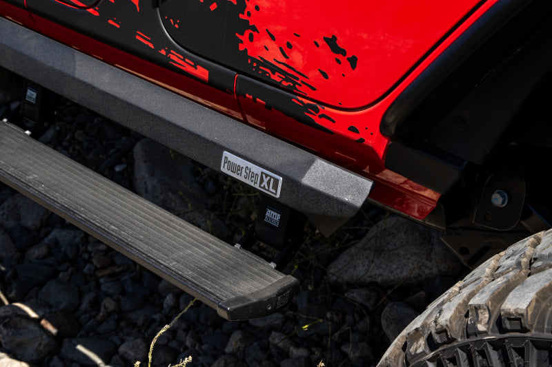 AMP Research 2007-2018 Jeep Wrangler JKU 4DR PowerStep XL - Black (Incl OEM Style Illumination) - Striker Modified