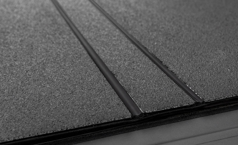 Access LOMAX Tri-Fold Cover Black Urethane Finish 19+ Chevrolet Silverado 1500 - 6ft 6in Bed - Striker Modified