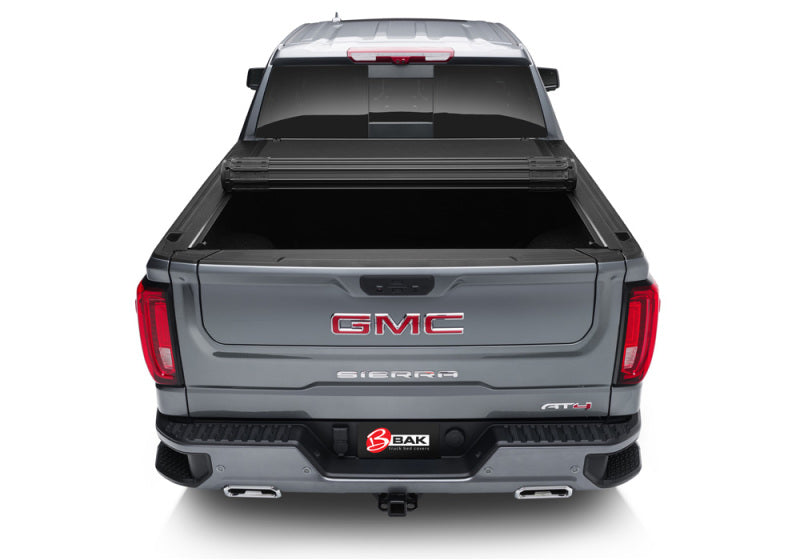 BAK 88-13 Chevy Silverado/GM Sierra Revolver X4s 6.6ft Bed Cover (2014 HD /2500 /3500) - Striker Modified