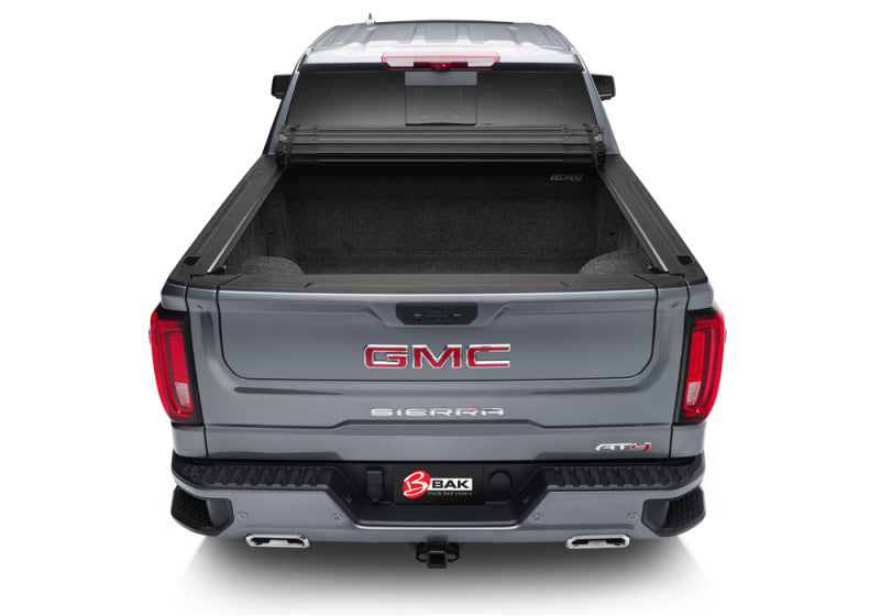 BAK 88-13 Chevy Silverado/GM Sierra Revolver X4s 6.6ft Bed Cover (2014 HD /2500 /3500) - Striker Modified
