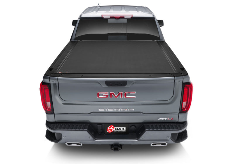 BAK 88-13 Chevy Silverado/GM Sierra Revolver X4s 6.6ft Bed Cover (2014 HD /2500 /3500) - Striker Modified