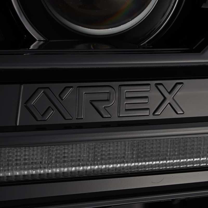 AlphaRex 12-15 Toyota Tacoma PRO-Series Projector Headlights Plank Style Alpha Black w/DRL - Striker Modified