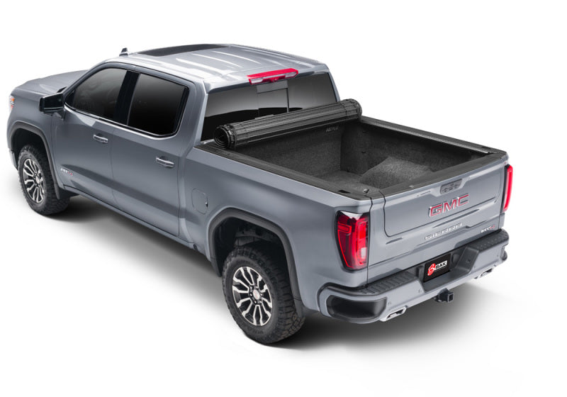 BAK 88-13 Chevy Silverado/GM Sierra Revolver X4s 6.6ft Bed Cover (2014 HD /2500 /3500) - Striker Modified