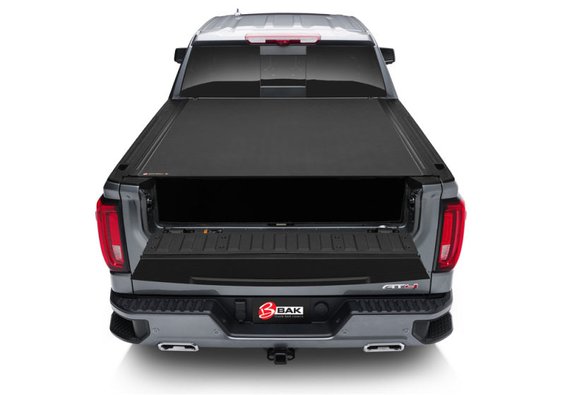BAK 88-13 Chevy Silverado/GM Sierra Revolver X4s 6.6ft Bed Cover (2014 HD /2500 /3500) - Striker Modified